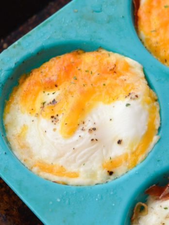 Try these Easy Cheddar Baked Eggs for a quick, low carb breakfast! You only need four basic ingredients to make this protein packed breakfast recipe!