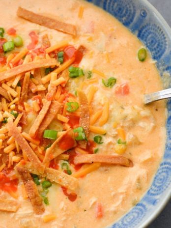 This Slow Cooker Buffalo Chicken Chili is loaded with shredded chicken, white beans, vegetables, sharp cheddar cheese and tangy buffalo sauce!