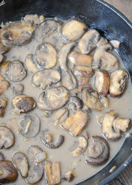 creamy mushroom sauce in a cast iron skillet