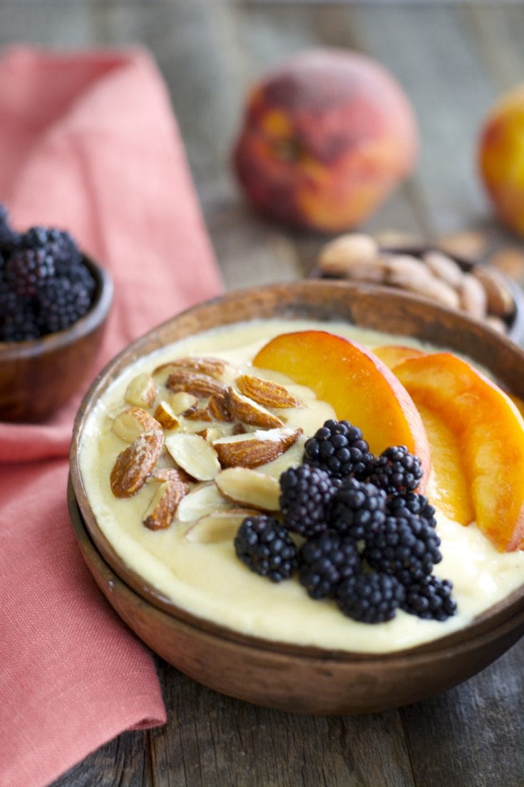 https://www.maebells.com/wp-content/uploads/2016/07/peaches-cream-smoothie-bowl3-735x1103.jpg