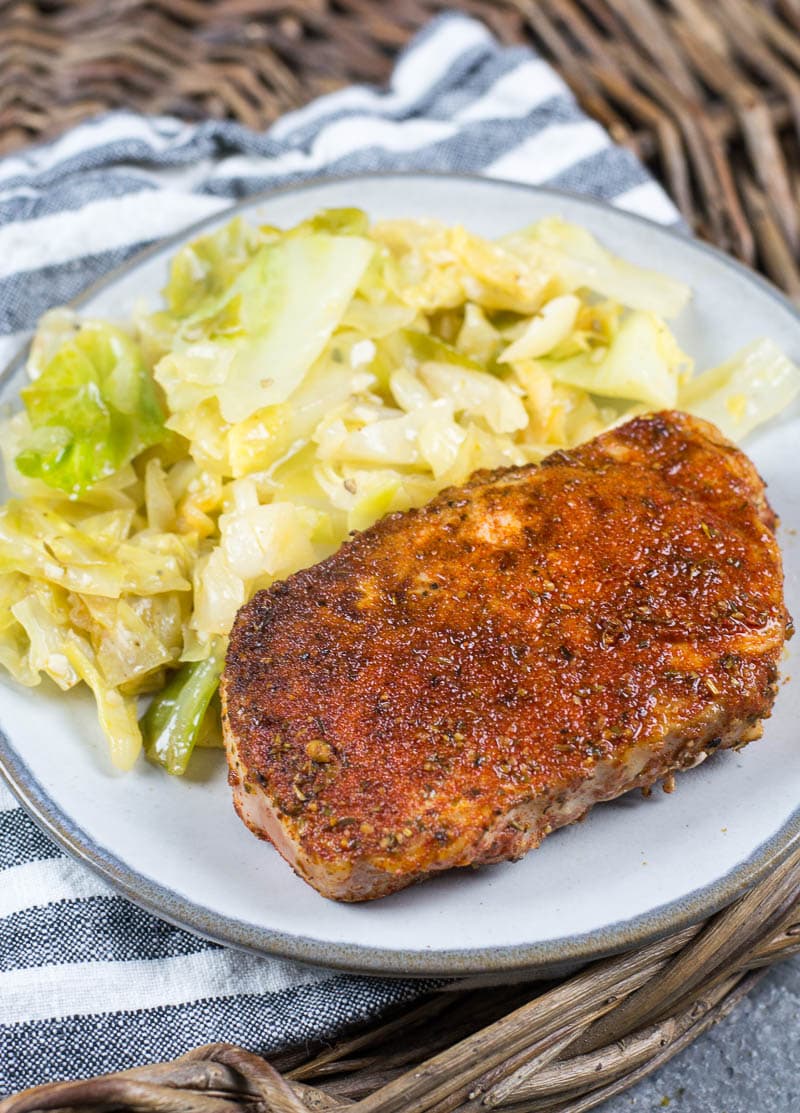 This easy Cajun Pork Chops and Fried Cabbage dish is the easiest one pan, 30 minute meal! At just 3.7 net carbs this is a low carb, keto approved dinner you will love!