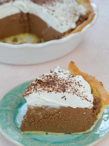 Try this Keto French Silk Pie for a decadent low carb dessert! At about 5 net carbs per slice this rich chocolate pie is an instant keto classic!