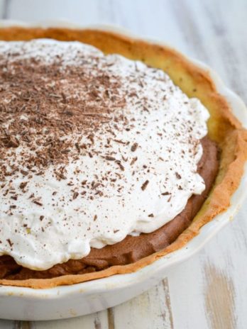 Try this Keto French Silk Pie for a decadent low carb dessert! At about 5 net carbs per slice this rich chocolate pie is an instant keto classic!