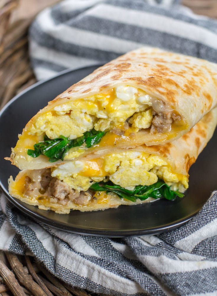 https://www.maebells.com/wp-content/uploads/2022/01/easy-sausage-spinach-breakfast-burrito-meal-prep-2-735x1000.jpg