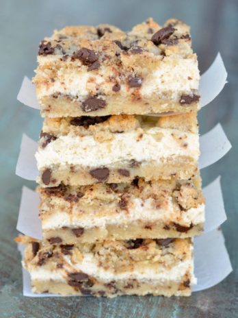 These Keto Chocolate Chip Cheesecake Bars combine sweet and delicious chocolate chip cookie dough with a creamy vanilla cheesecake layer! Each bar has less than 5 net carbs and is gluten free and keto-friendly! 