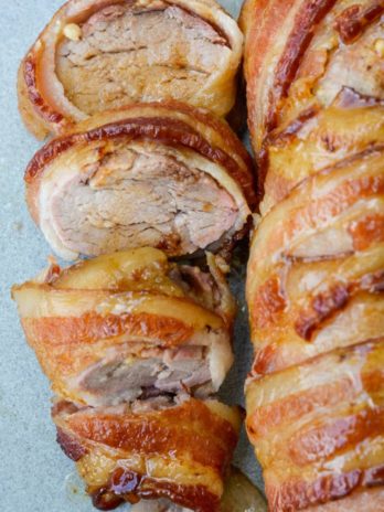 This Bacon Wrapped Pork Tenderloin is the juiciest, most flavorful dinner you can put on the table! This keto dinner has under 1 net carb per serving and is perfect for meal prepping.