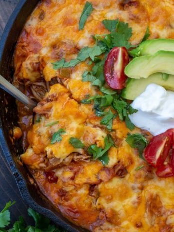 This one pan Chicken Enchilada Skillet is loaded with shredded chicken, tomatoes, green chilies and a creamy sauce! Enjoy a generous serving of this easy keto chicken recipe for under 5 net carbs!