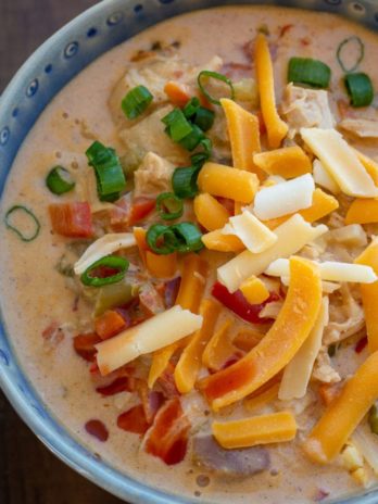 This Creamy Cajun Chicken Soup is loaded with tender chicken, peppers, onions, celery and cajun spices! You can enjoy a large serving of this cheesy keto soup recipe for only 8 net carbs!