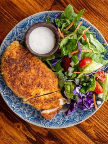 Crispy Parmesan Crusted Chicken is the perfect weeknight meal! This easy chicken recipe requires basic ingredients and is gluten free, low carb and keto-friendly!