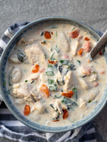 This creamy Chicken Gnocchi Soup recipe is the perfect comfort food! Tender chicken is paired with vegetables and gnocchi for a hearty, healthy meal!