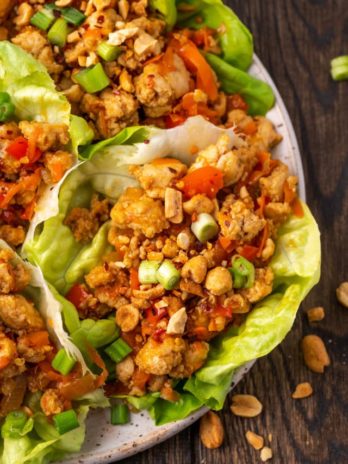 Overhead view of Asian chicken lettuce wraps on plate