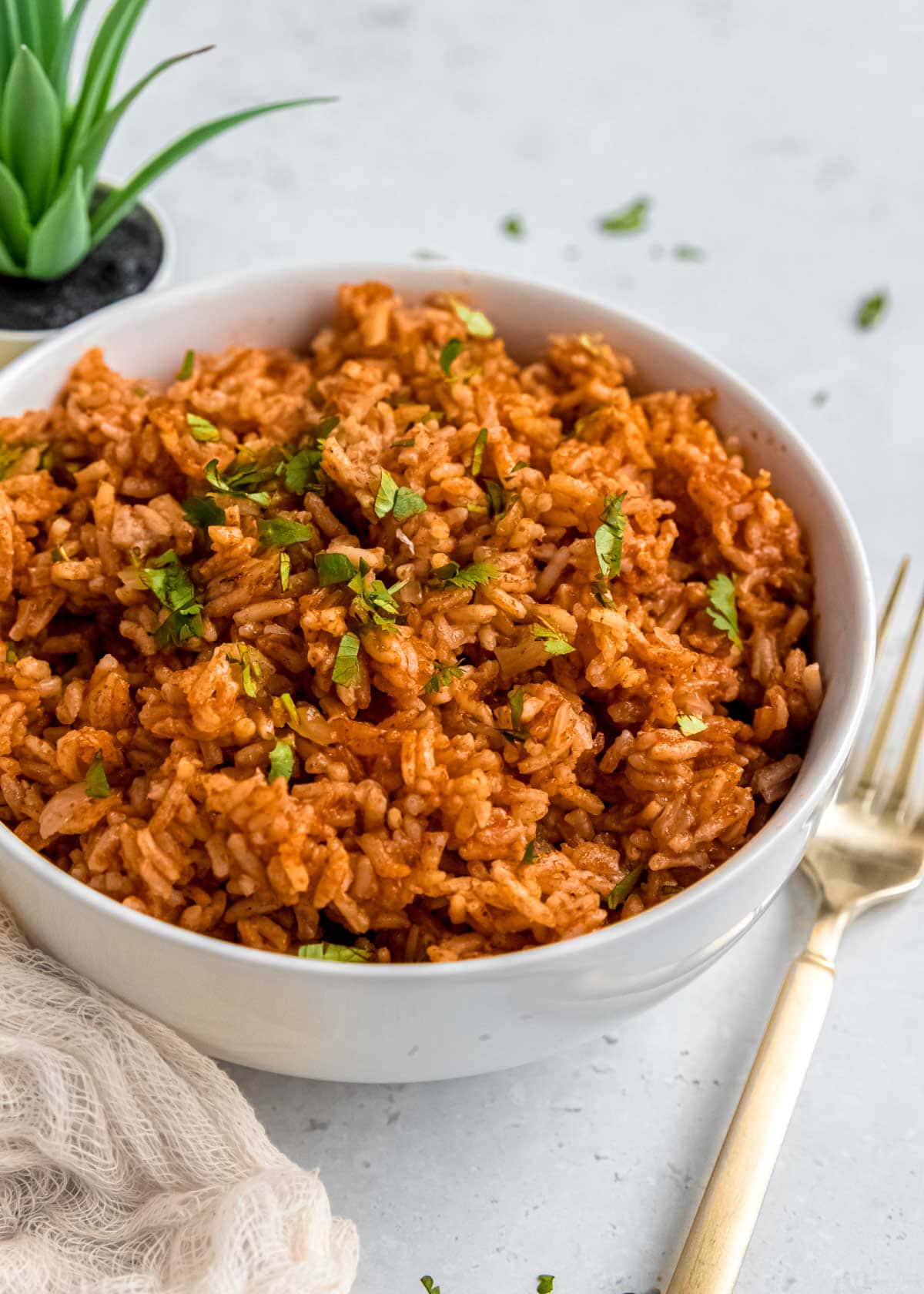 instant pot mexican rice in bowl with fork and napkin 