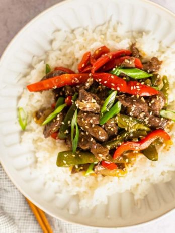 Pepper steak on a plate with rice