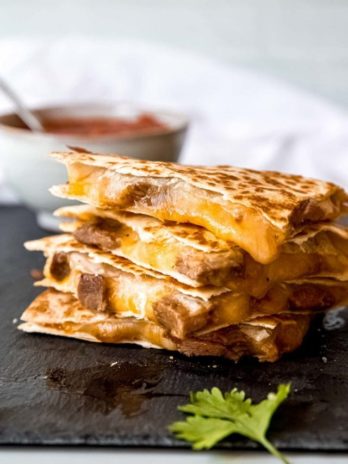 steak quesadilla on gray background