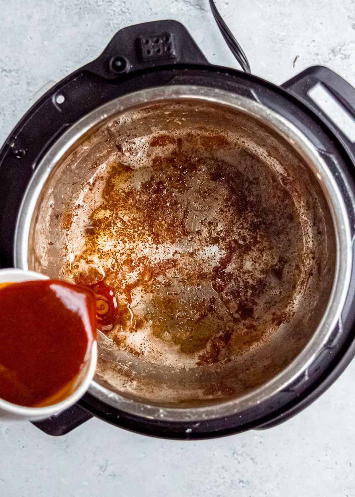 homemade asian sauce poured into instant pot