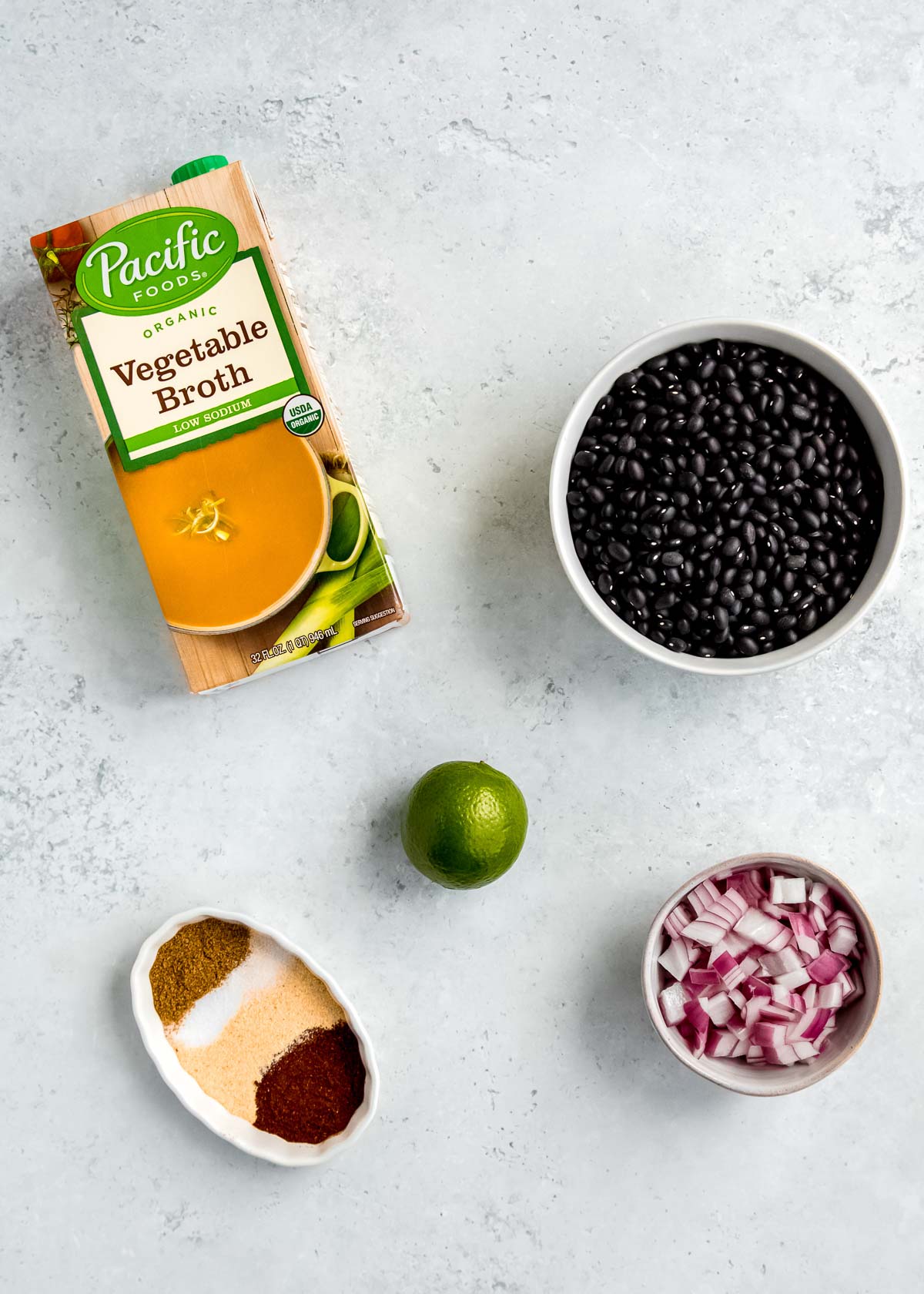 instant pot black bean ingredients on a white table