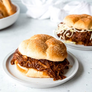 A tender, juicy pulled pork recipe that doesn't require hours to prepare! This Instant Pot Pulled Pork recipe will impress your friends and family without the time and effort required by traditional pulled pork recipes!