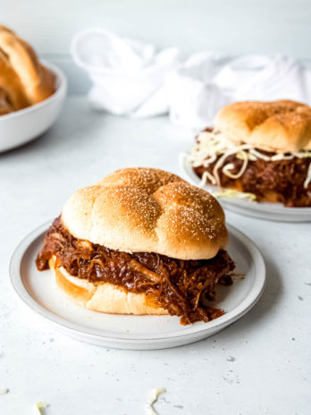 A tender, juicy pulled pork recipe that doesn't require hours to prepare! This Instant Pot Pulled Pork recipe will impress your friends and family without the time and effort required by traditional pulled pork recipes!