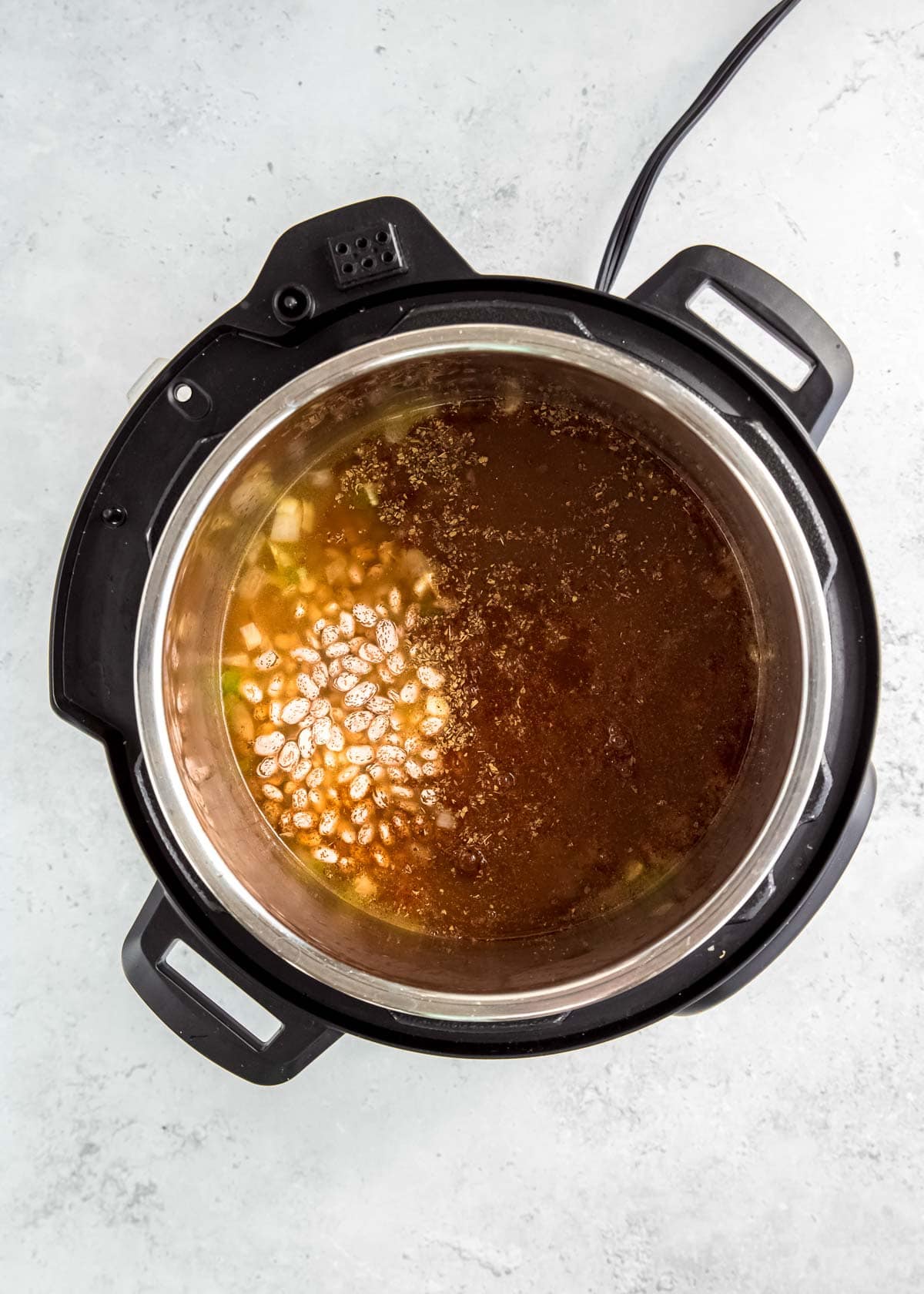 jalapeno, onions, and broth in instant pot