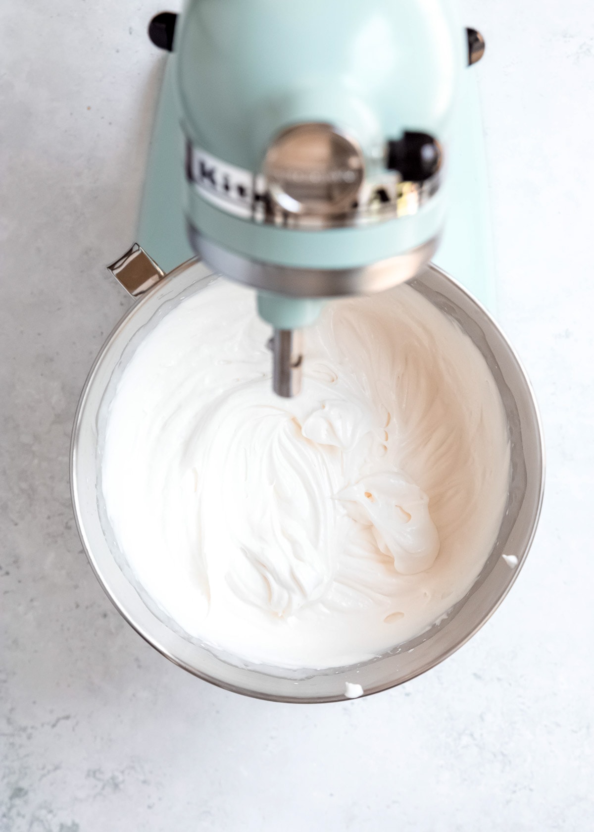 heavy whipping cream in a mixing bowl 