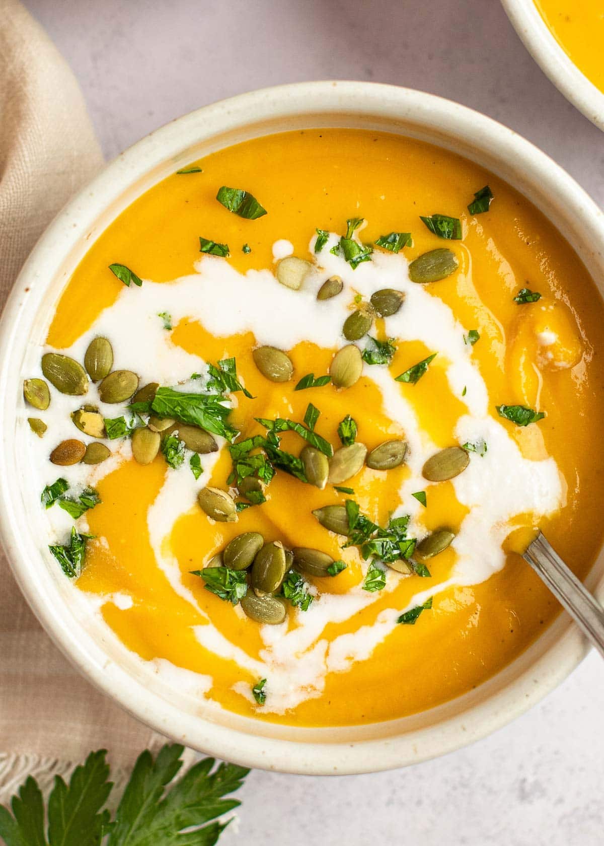 a bowl full of easy fall soup using the best butternut squash soup recipe