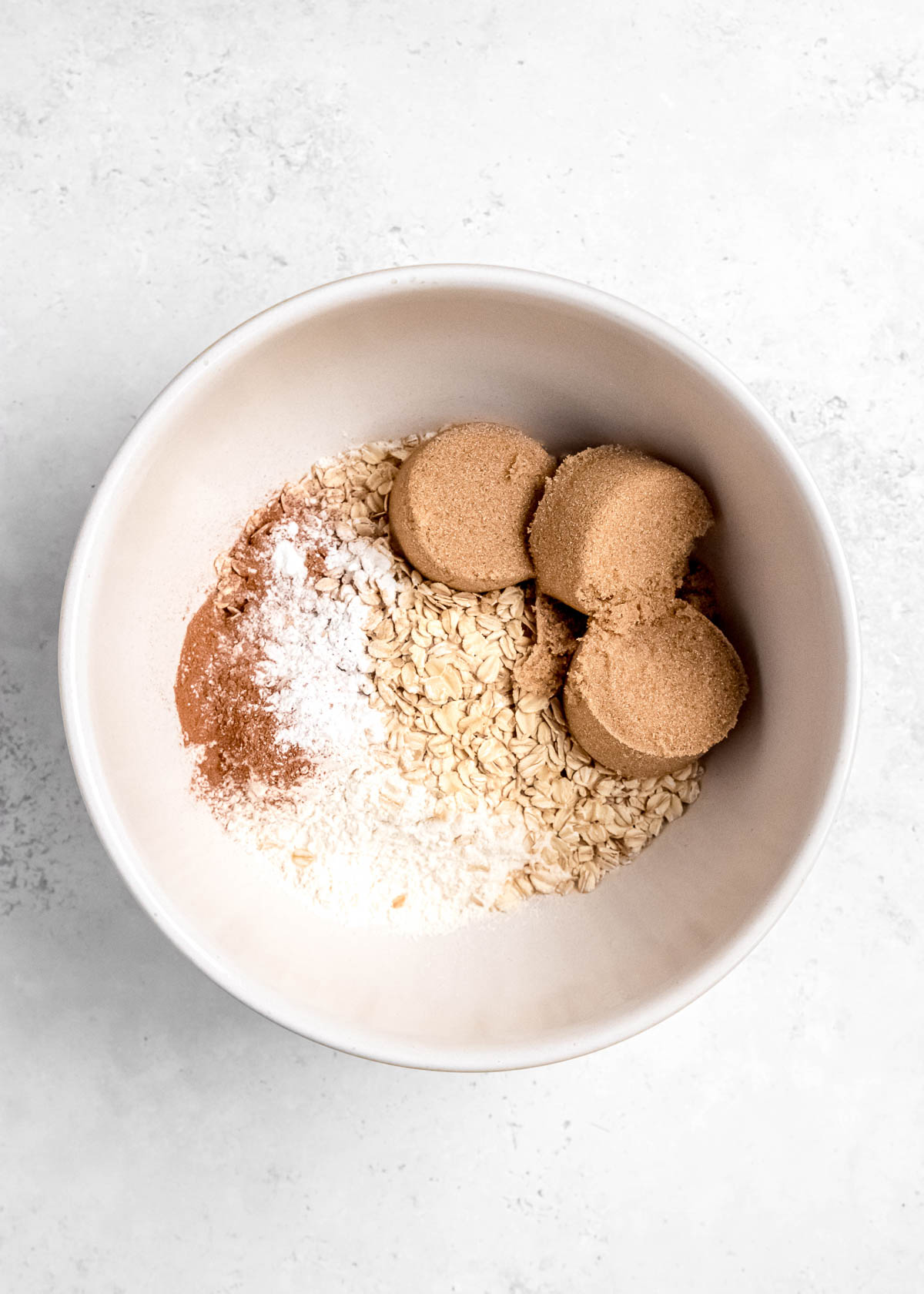 apple crumble ingredients in a bowl