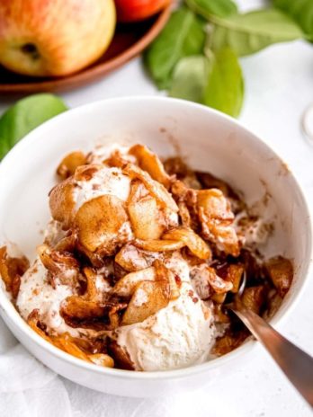 These delicious Air Fryer Apples are the perfectly tender and full of warm, cinnamon flavor! Air fried apples are the best topping for oatmeal, ice cream, and more.