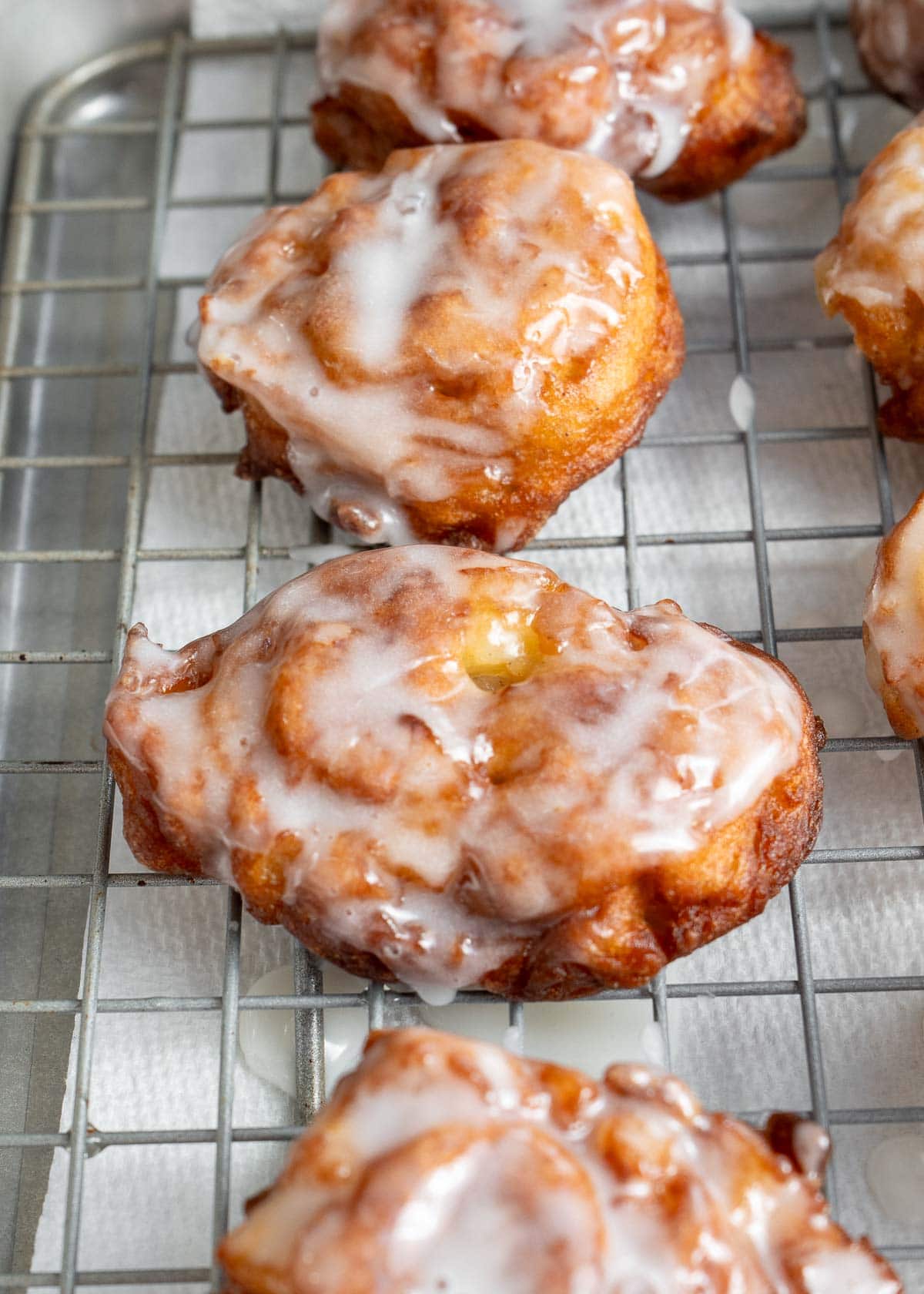 apple fritters on wire rack