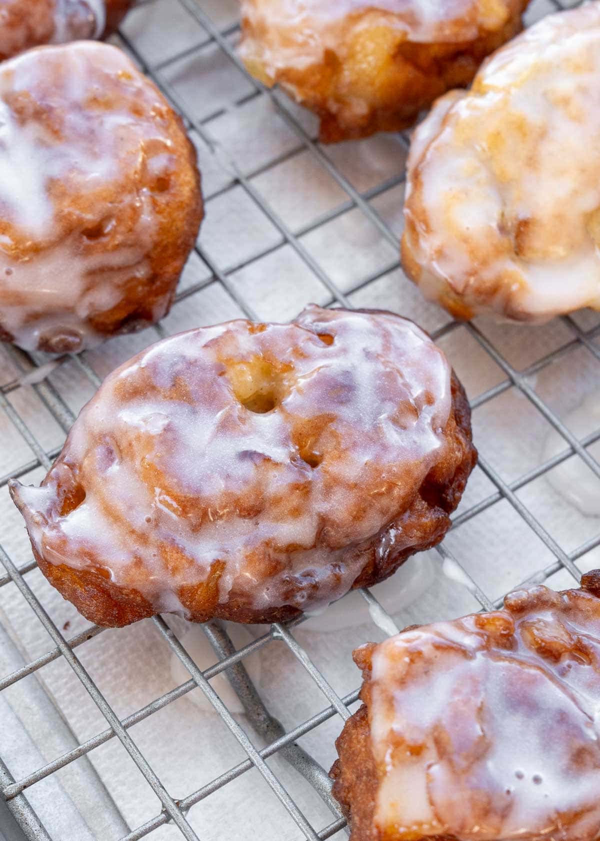 hot fritters cooling on a wire rack