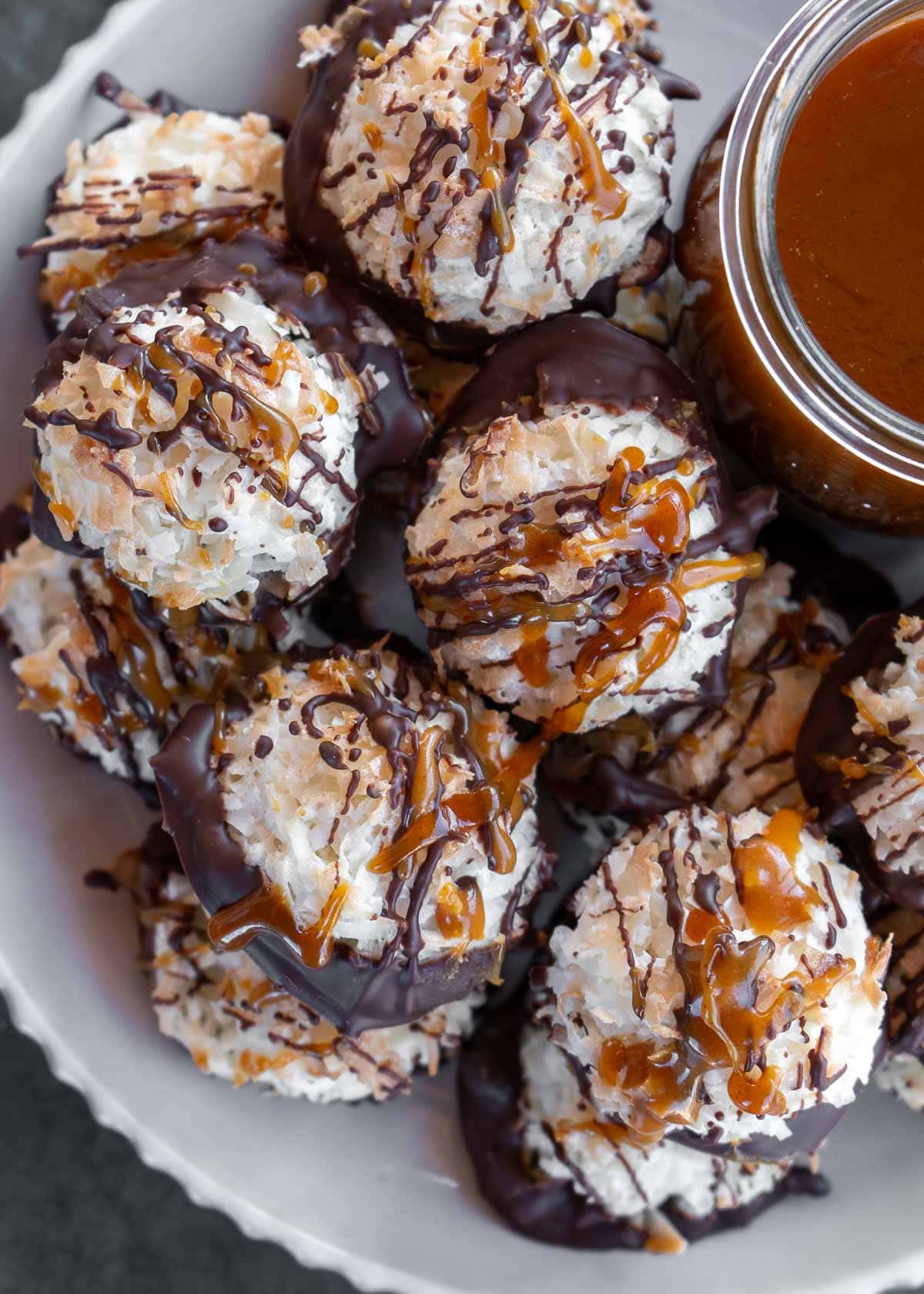 overhead shot of coconut macaroons with chocolate and caramel