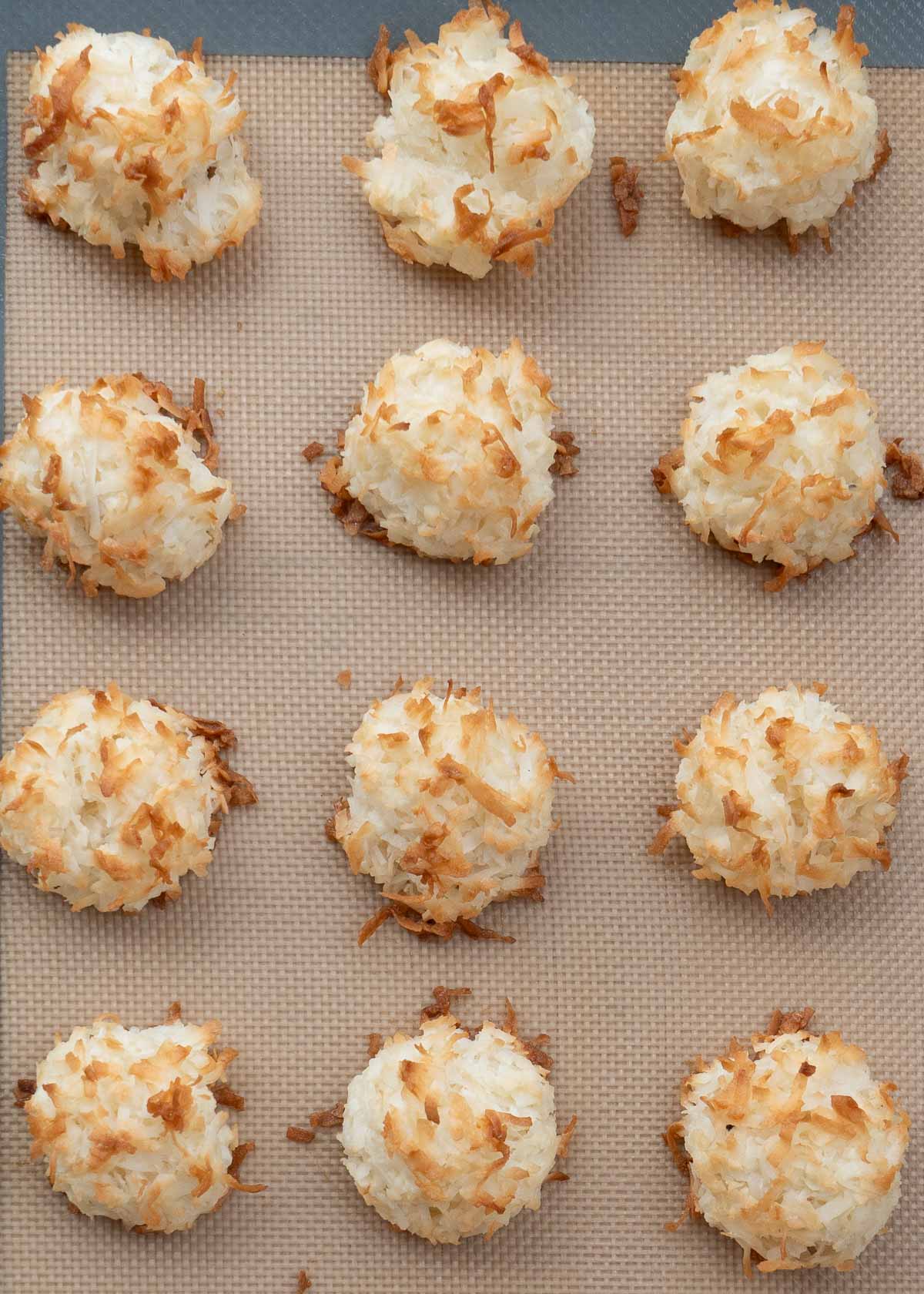 baked coconut macaroons on a baking sheet