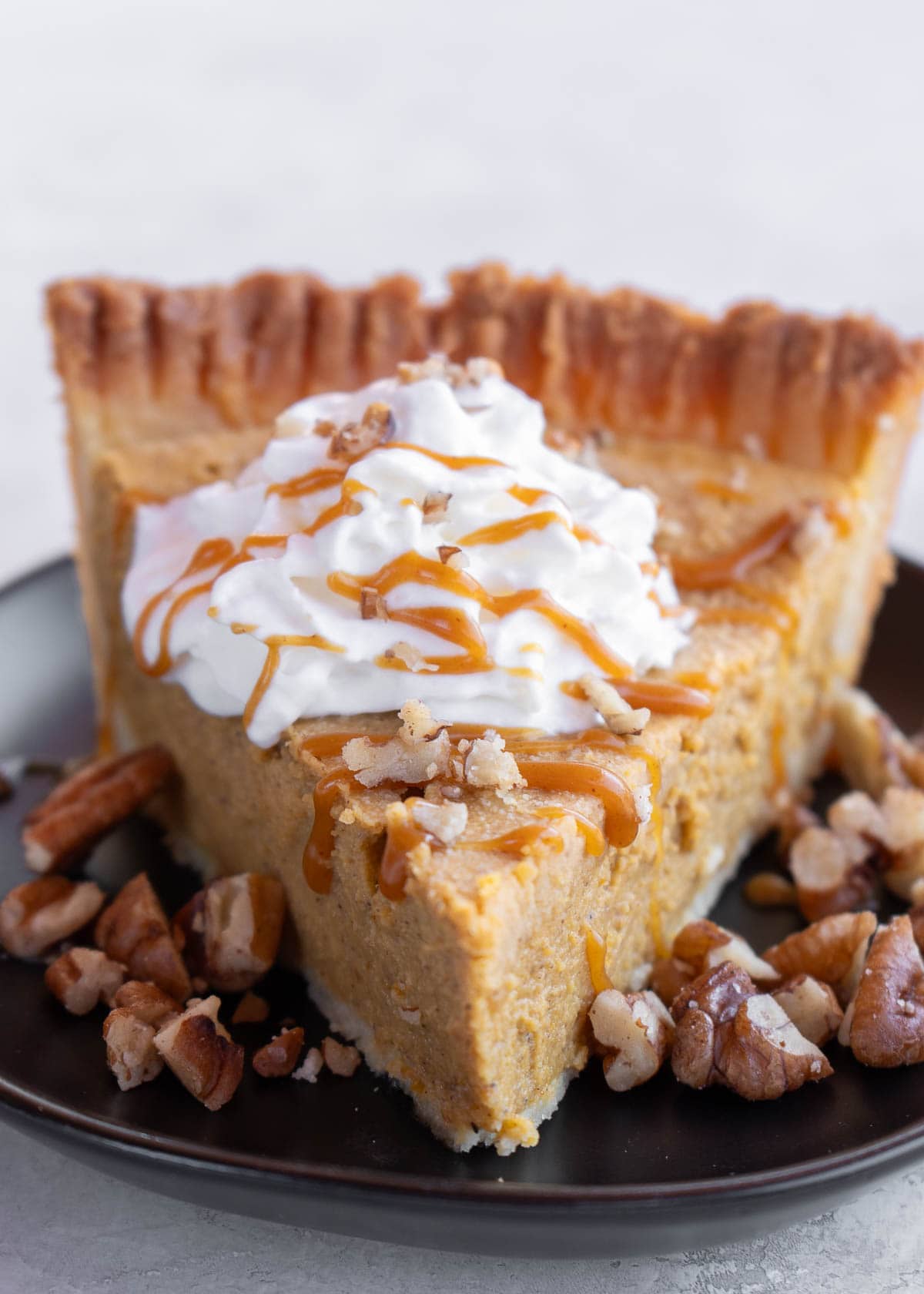 A close up shot of gluten free pumpkin pie