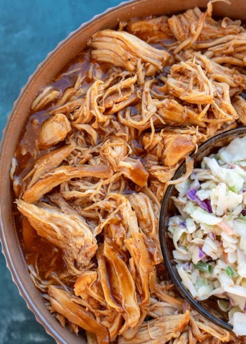 shredded BBQ chicken with a side of coleslaw