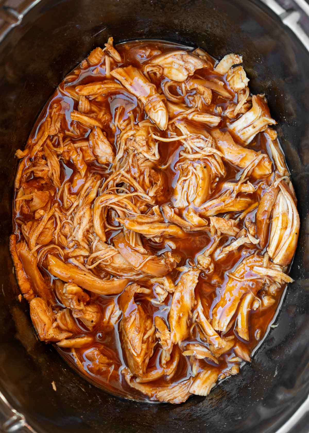 shredded crockpot bbq chicken in slow cooker