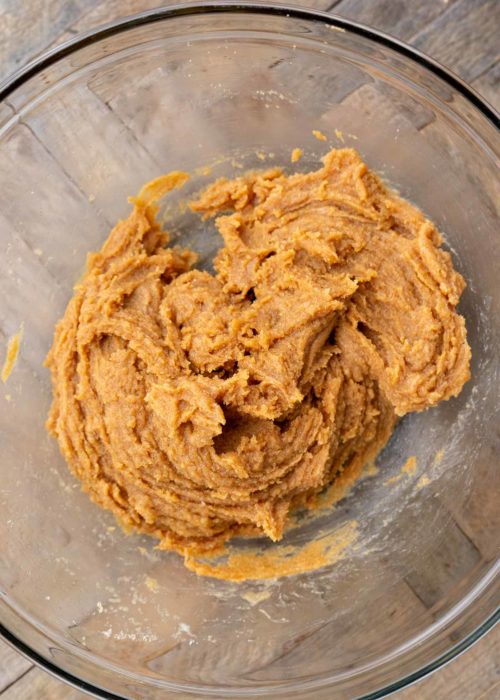 flourless peanut butter cookie dough mixed in a glass bowl