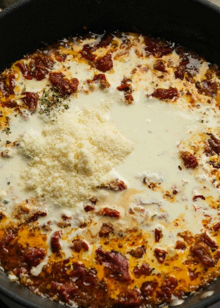 heavy cream and parmesan in pan