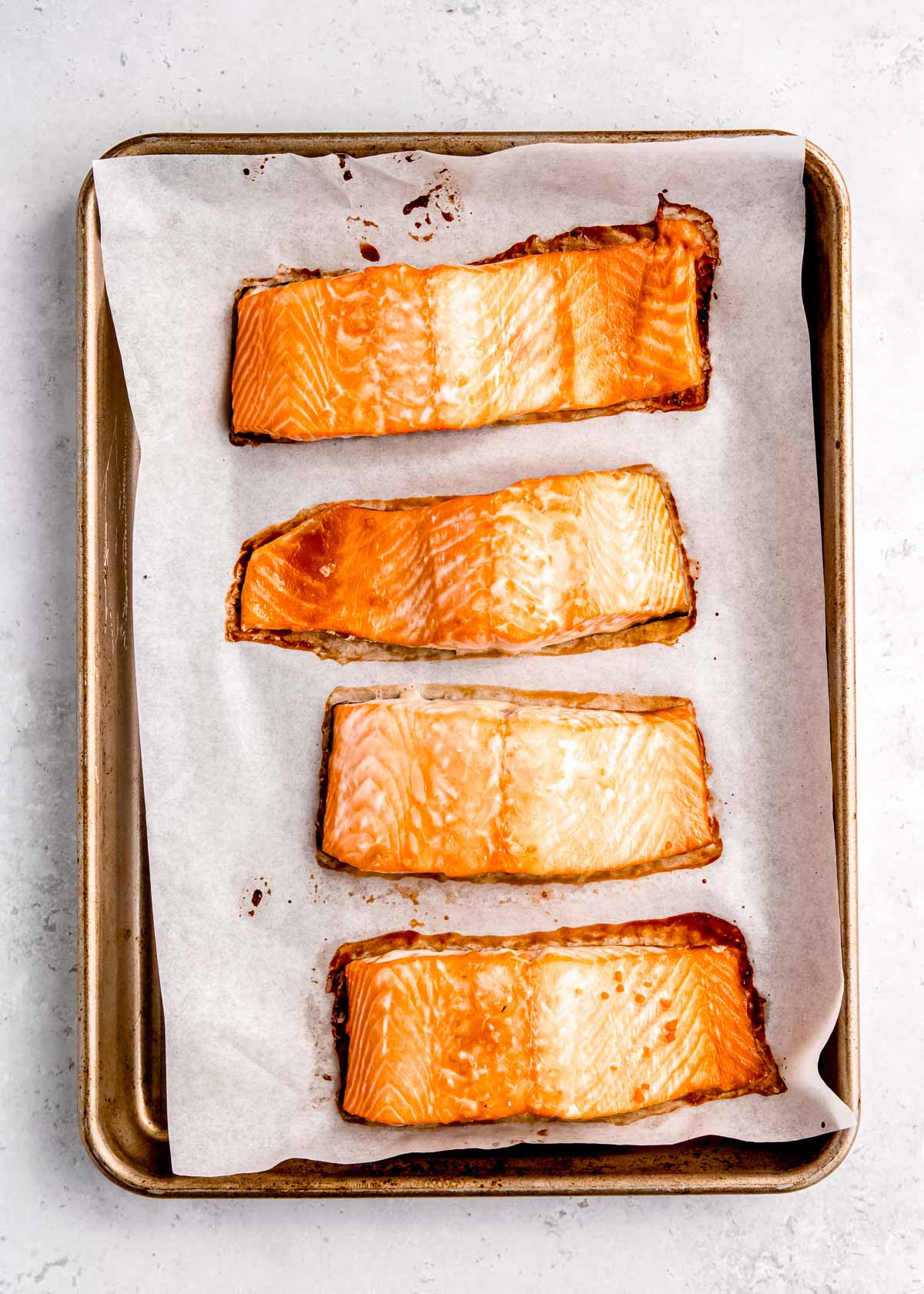 cooked salmon on baking sheet