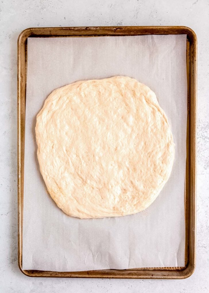 pizza dough on a sheet pan