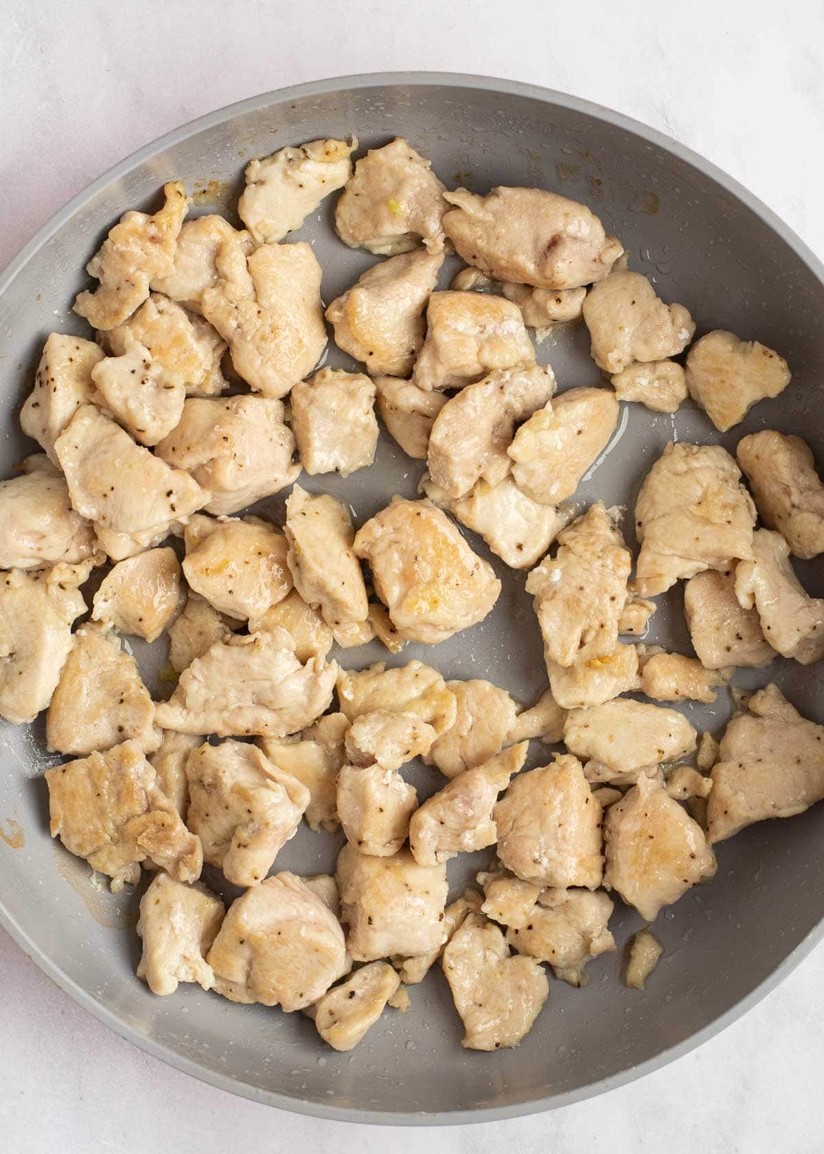 browned chicken in skillet