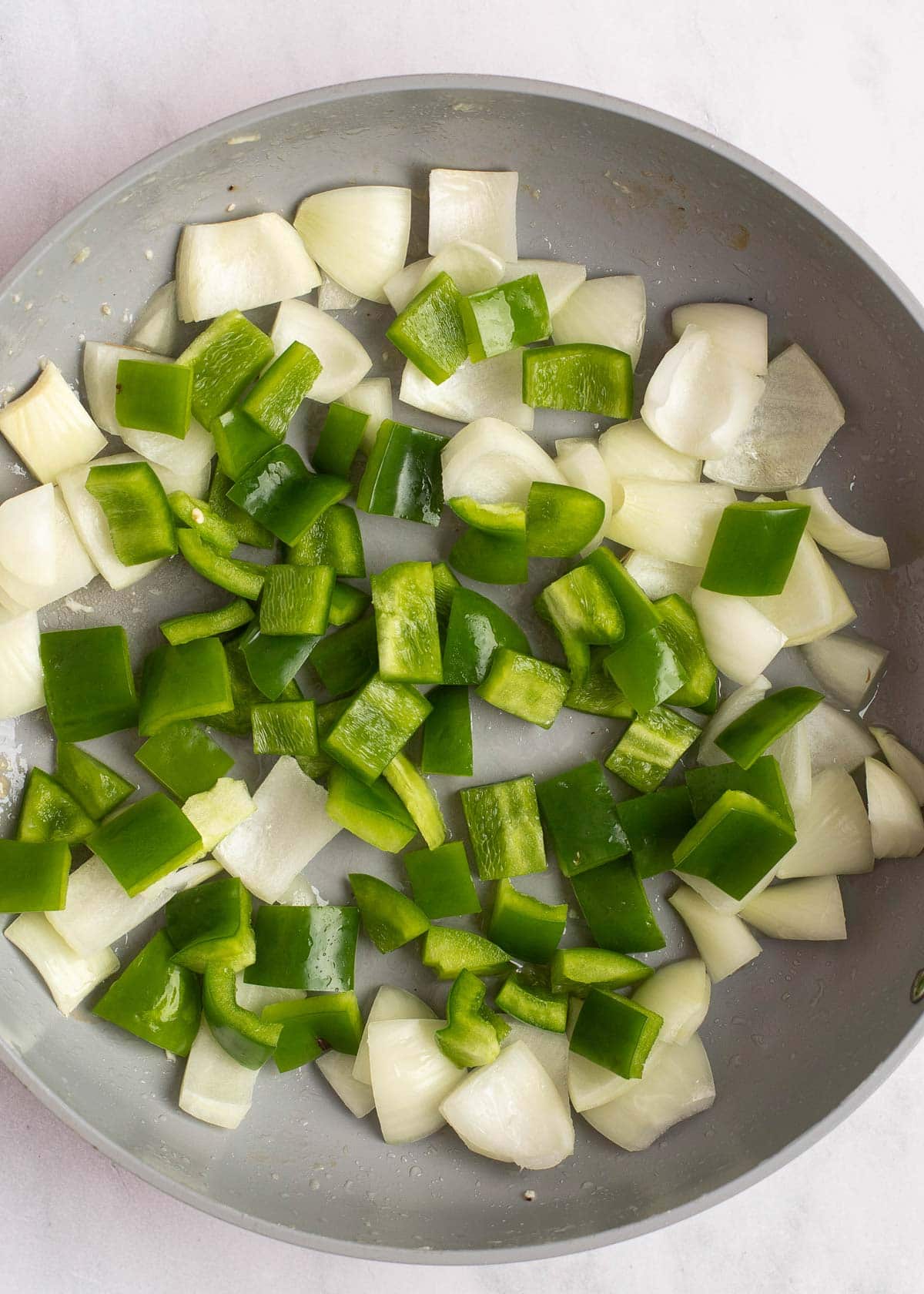 bell pepper and onion in a skillet