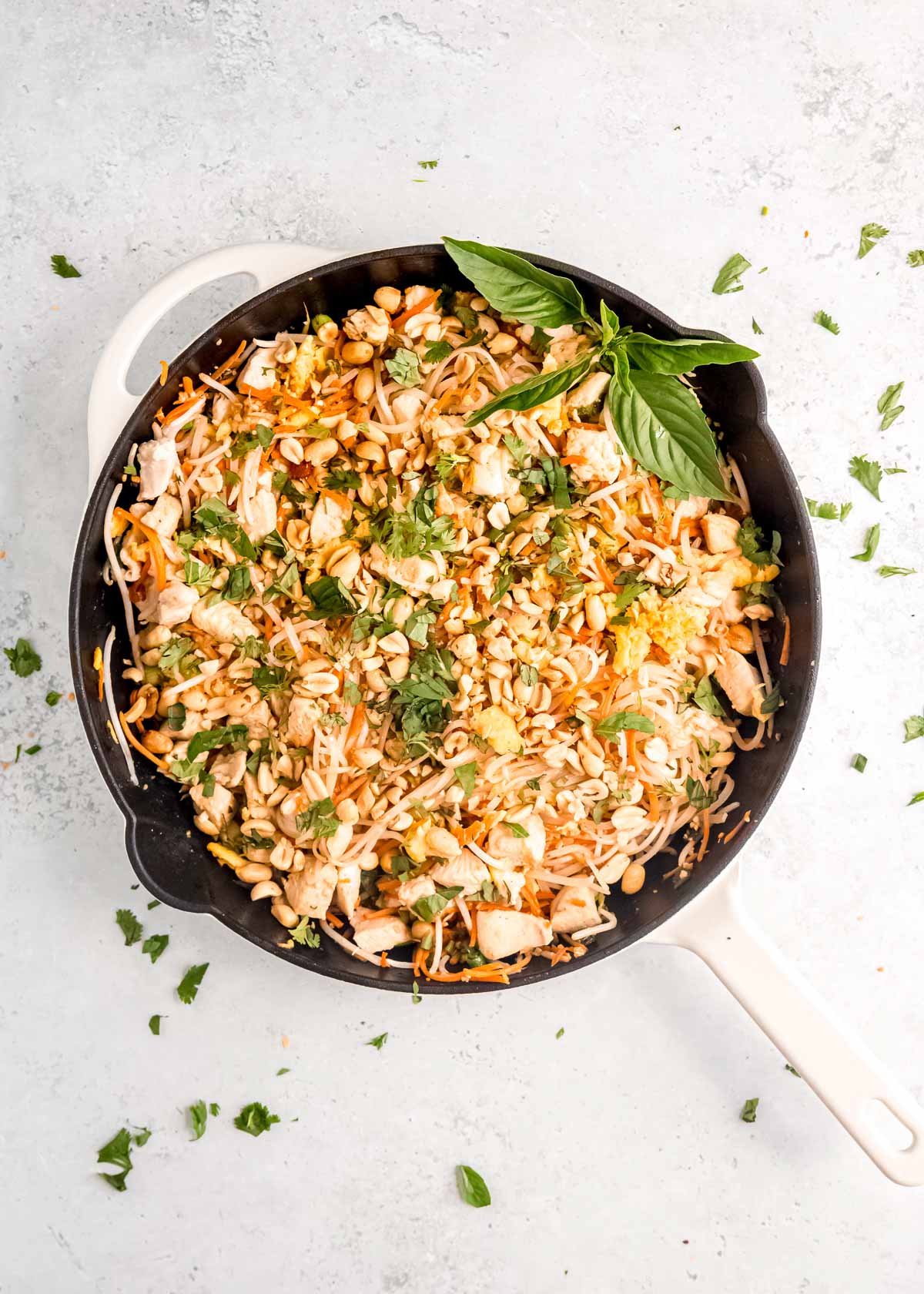 chicken pad thai in skillet