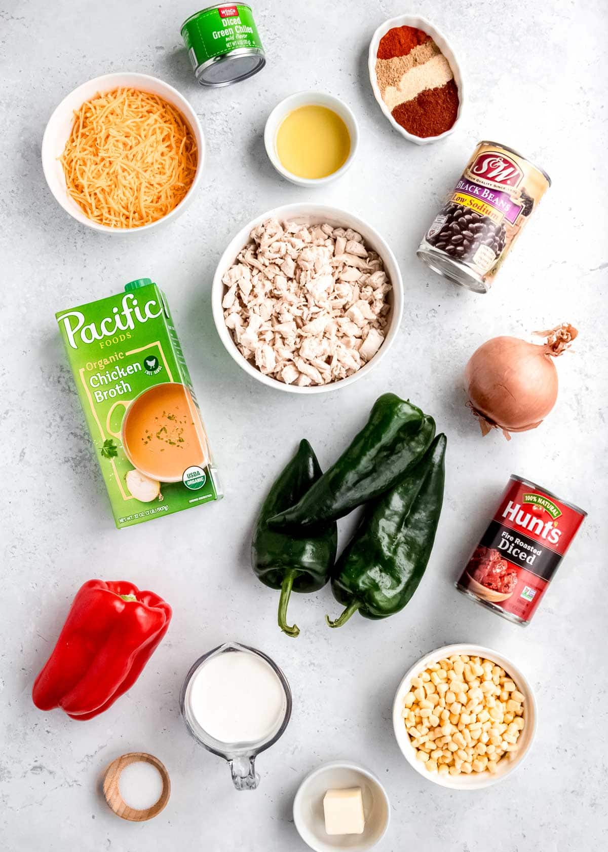 chicken poblano soup ingredients on a white table 