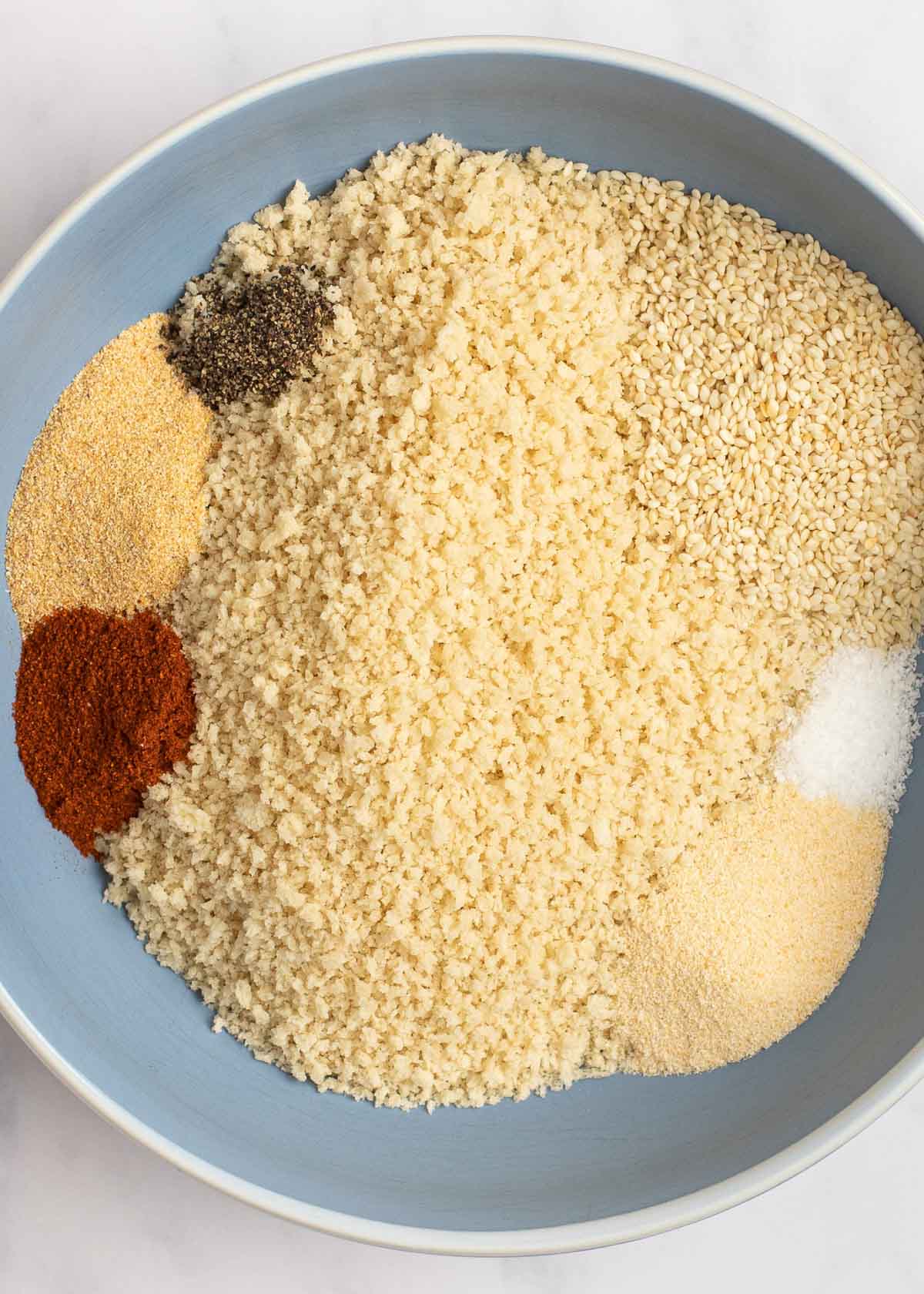 flour and spices in blue bowl