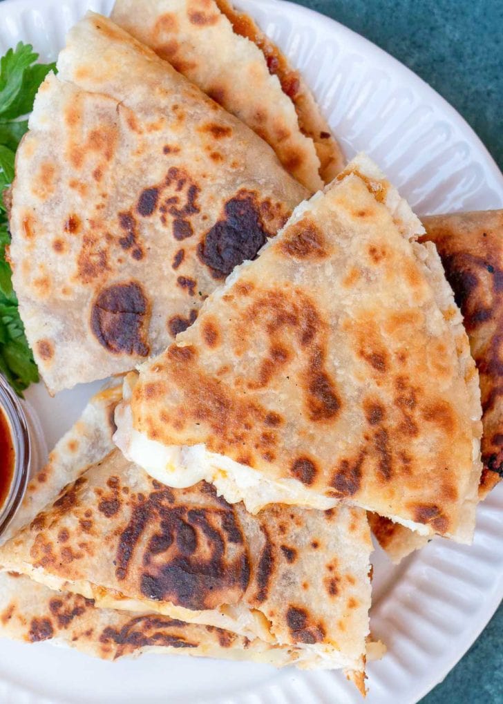 bbq chicken quesadilla slices on a white plate