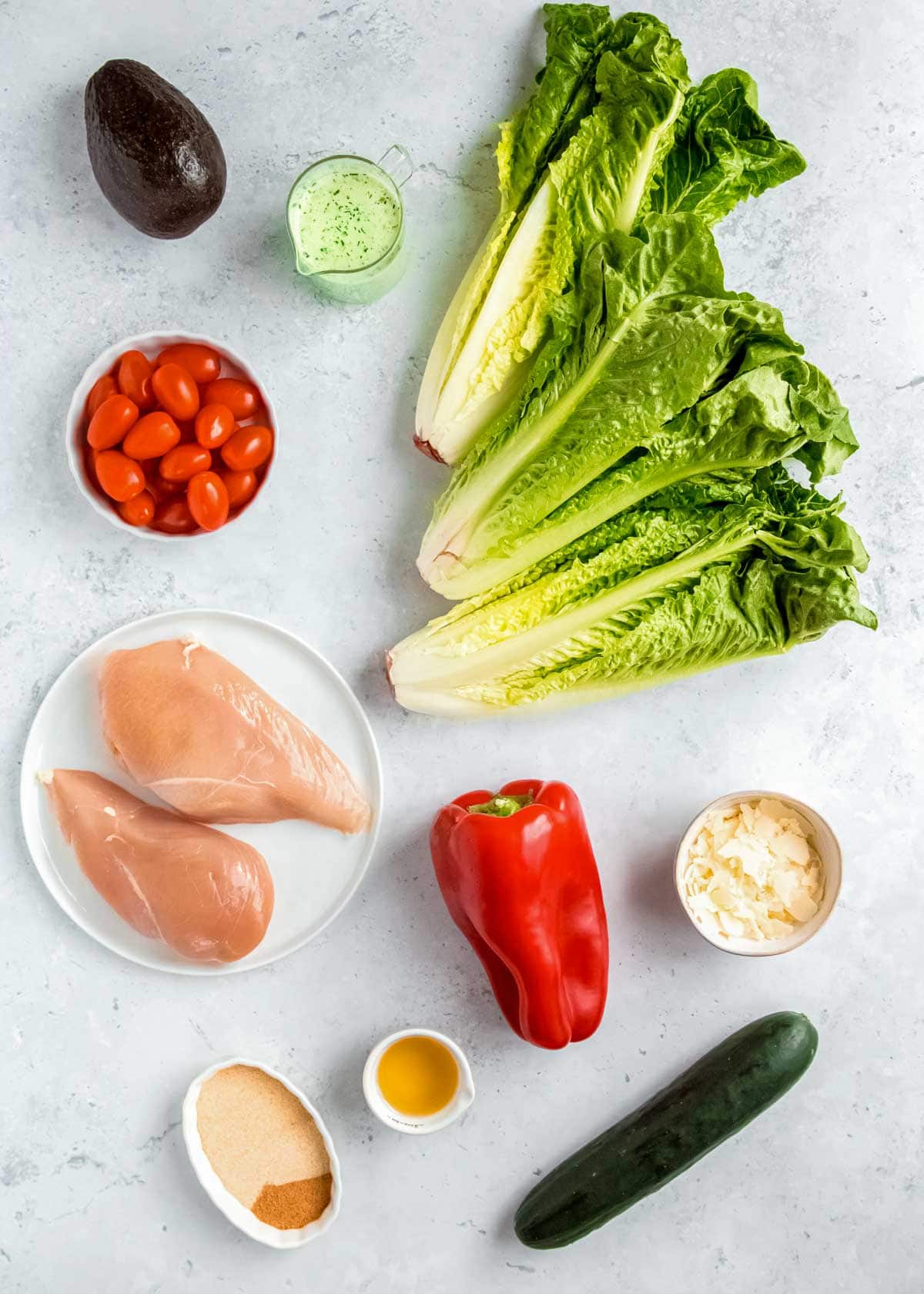 green goddess salad ingredients on a white table