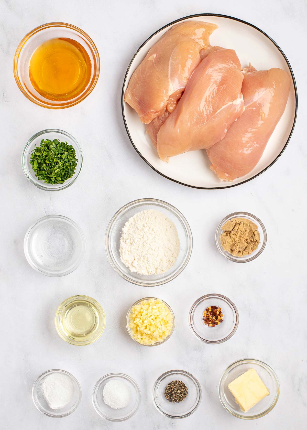 honey garlic chicken ingredients on a white table