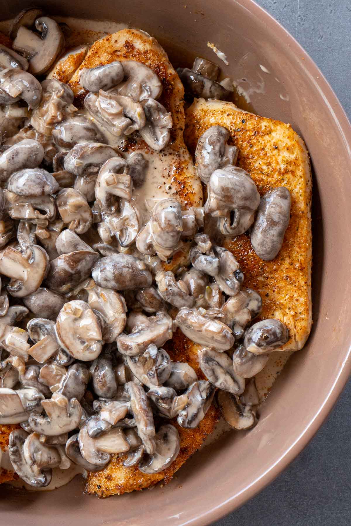 chicken topped with creamy mushrooms 