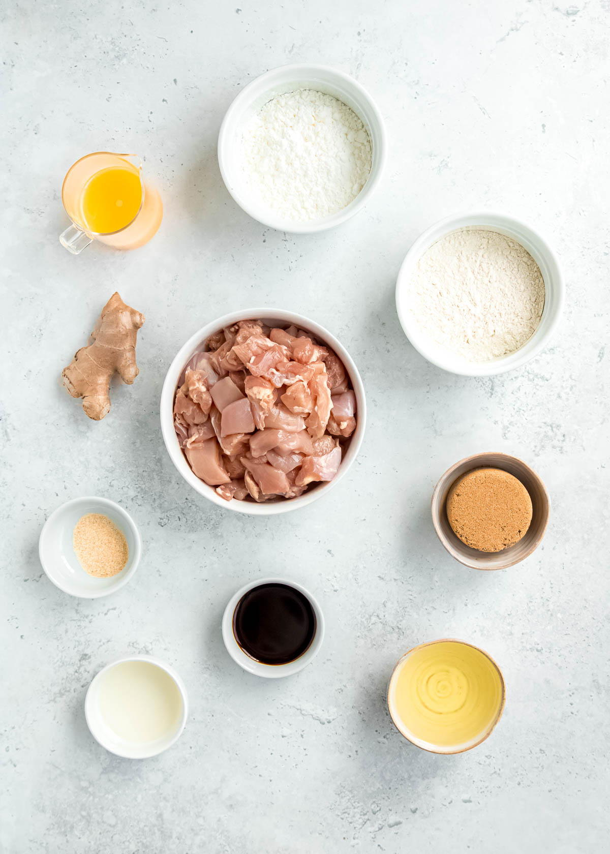 orange chicken ingredients on a white table