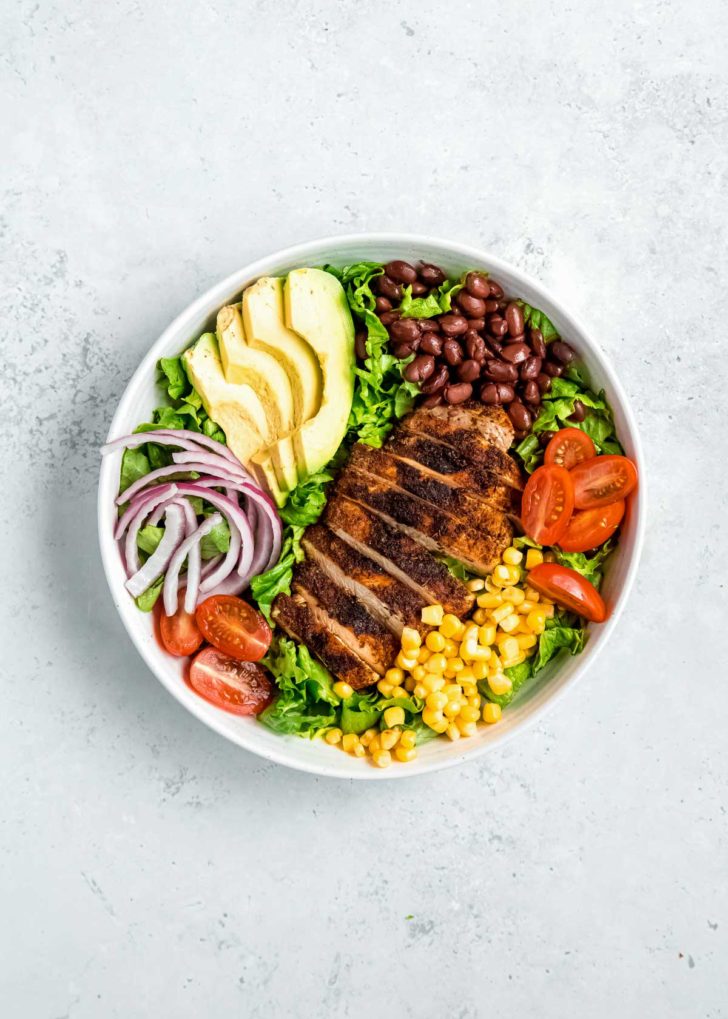 southwest chicken ingredients in a white bowl