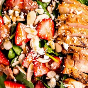 close up image of strawberry spinach chicken salad